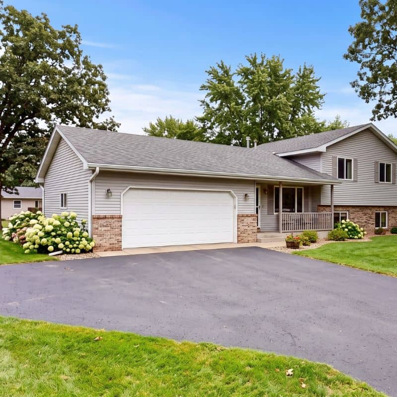 White double garage door serviced by After Hours Garage Doors in Upsala, MN